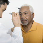 man receiving eye exam