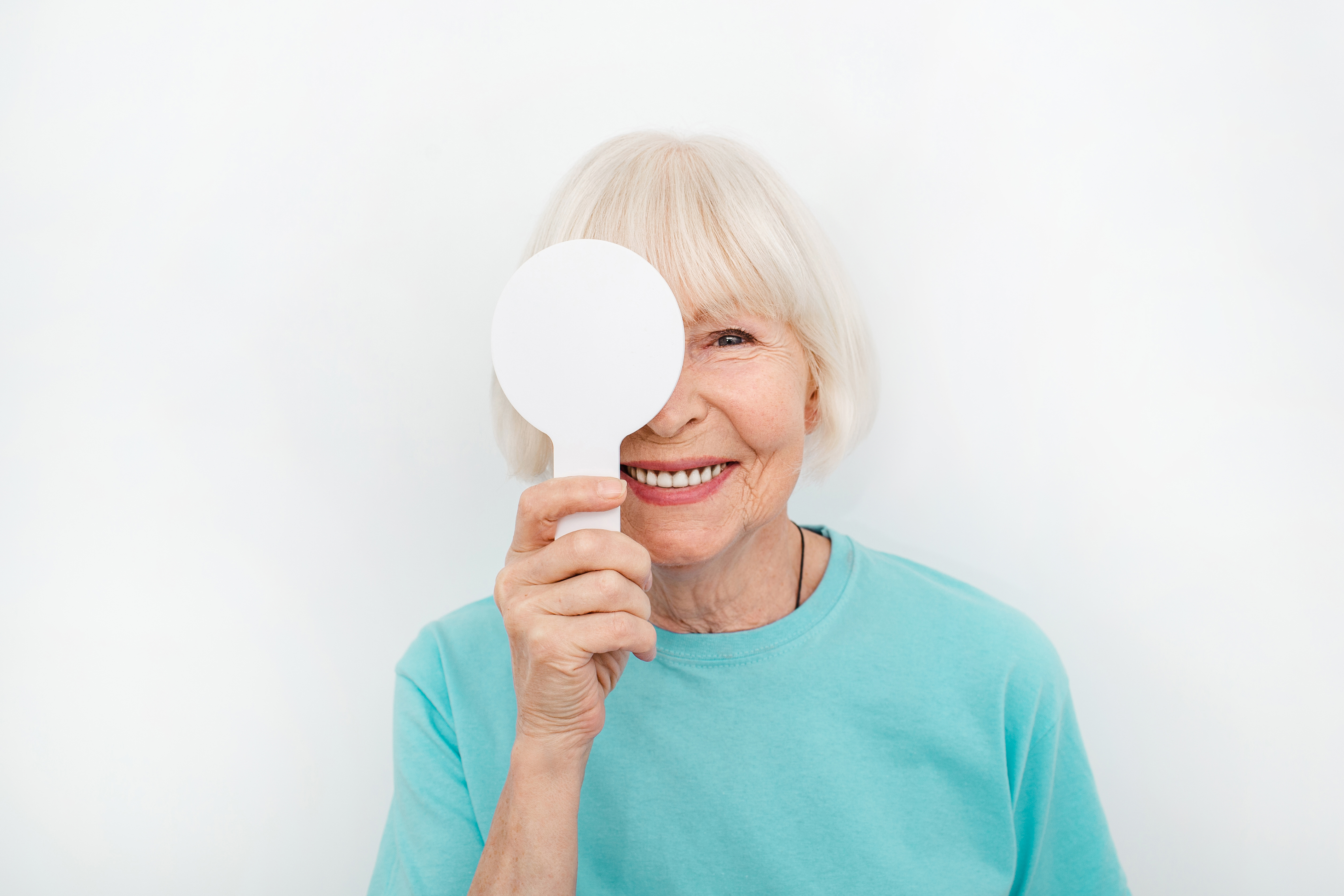Woman with paddle during eye exam